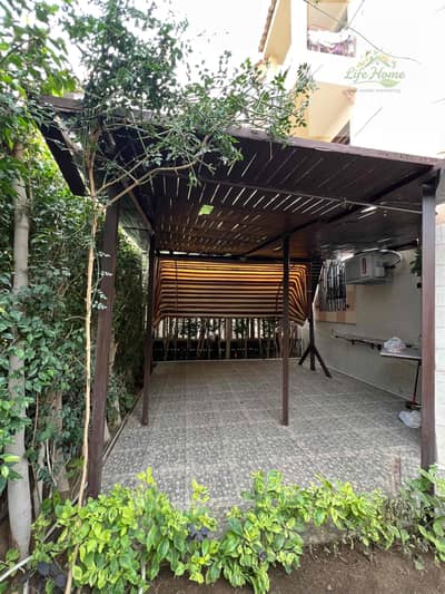 Hotel rental in Al-Rehab, ground floor apartment with a private garden, ultra-luxurious finishing
