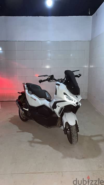اسكوتر sym husky adv200