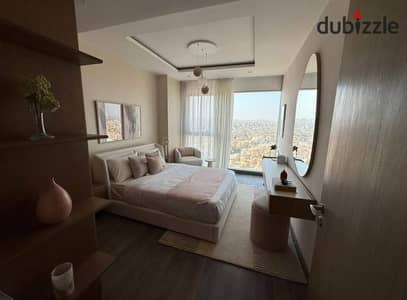 شقة  متشطبه بالتكيفات بأبراج ZED بالشيخ زايد فيو لاند سكيب