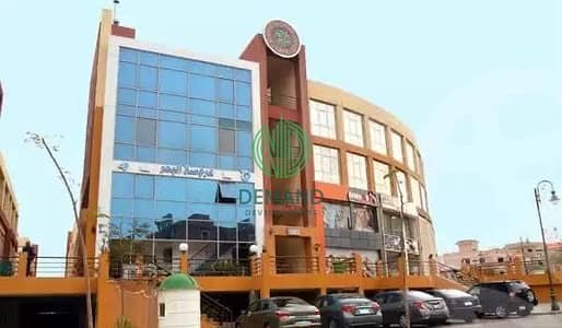 Shop  60 sqm fully finished with Ac's for sale in Al-Moez Mall, Rawdat Zayed, District 12 - elsheikh zayed