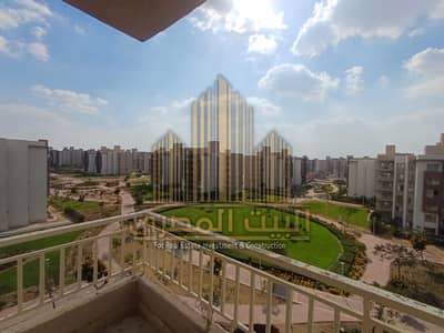 Apartment for sale in Wasal Residence Compound, 170 sqm, in front of Madinaty. Prime location with a wide garden view.