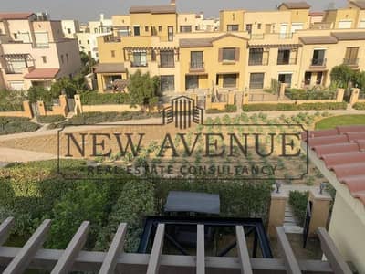 Town House middle for sale in mivida avenues fully finished direct on landscape and greenery with private garden and out door area Ready to move