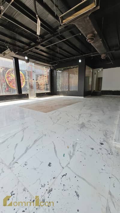 Commercial shop for sale, fully finished and ready to operate, on South 90th Street, Sector 2, near Mohamed Naguib Axis – Fifth Settlement, New Cairo