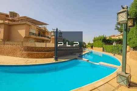 For Sale Resale Premium Villa in River Walk Compound (by Wadi Degla), ready for immediate delivery, fully finished with equipped kitchen.