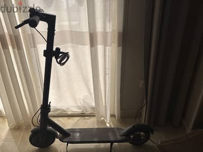 M365 electric scooter made xiaomi with its cable