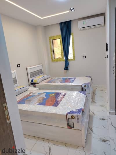 Apartment for sale, divided into studios, finished and furnished to an ultra-super-lux standard, in the second district, seventh neighborhood, next to