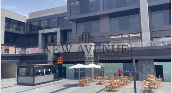 مطعم وكافيه بمساحه خارجيه ومخزن  للإيجار في هول تاون الشيخ زايد من بالم هيلز  hale town El-Sheikh Zayed by palm hills