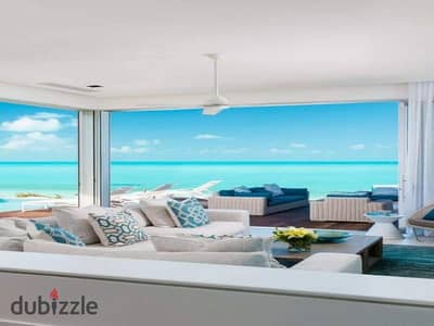 Next to Marina 1 and the yacht marina, a great deal on a two-bedroom chalet, fully finished with air conditioning, for sale in the North Coast, El Ala