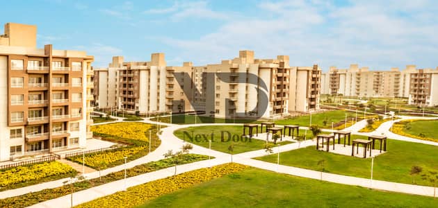 A premium ground floor apartment with a private garden in a high-end WESAL compound