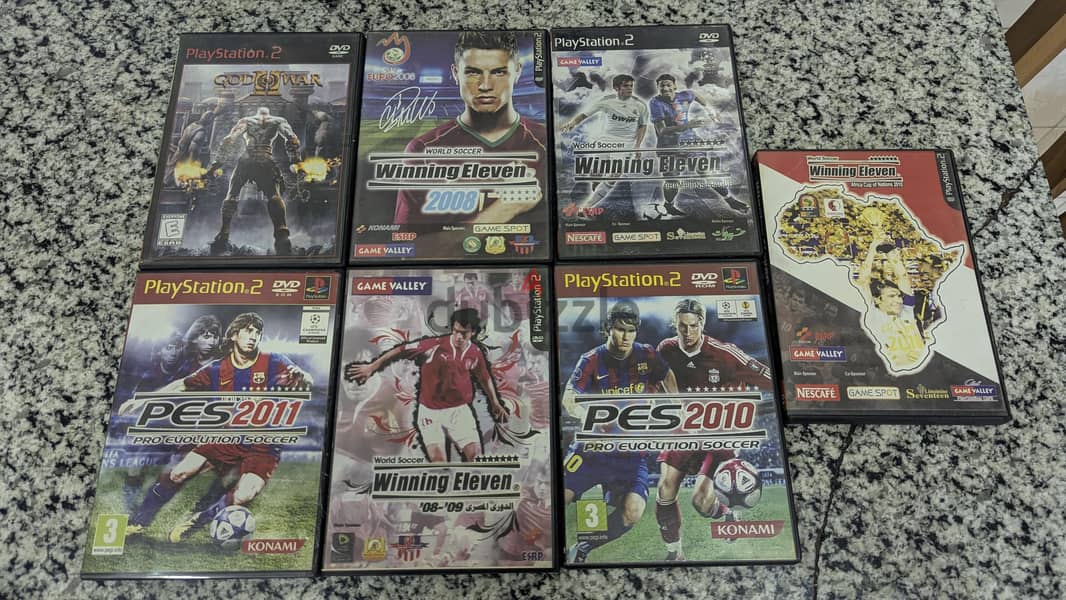 Playstation 2 with 4 Controllers & Games 1
