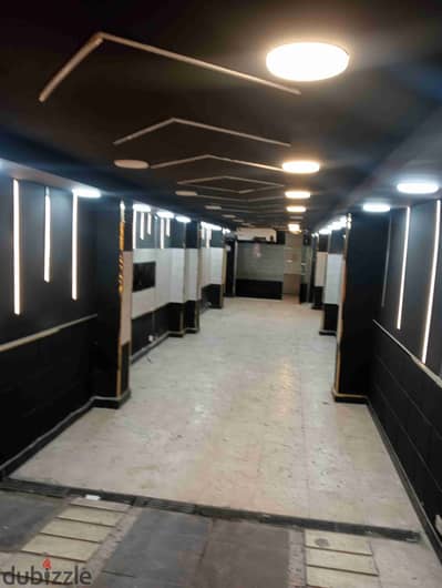 Commercial store for rent on a main street in Dokki, excellent lively