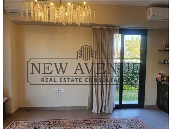 Town house corner for sale compound Al Burouj, Imkan misr, ready to move in, luxurious finishing with kitchen and AC's direct on landscape