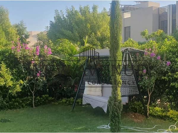 Town house corner for sale compound Al Burouj, Imkan misr, ready to move in, luxurious finishing with kitchen and AC's direct on landscape
