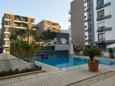 Apartment for sale, resale,Ready to move, ultra-super-lux finishing, with kitchen, open view, at the lowest price in Taj City Compound.