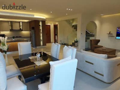 for sale townhouse with landscape ready to move in prime location in October near to  mall  of Egypt