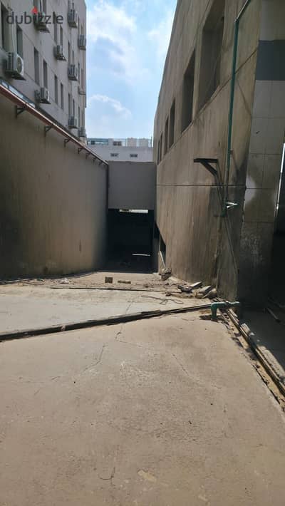 Warehouse for sale in Fifth Settlement Industrial Area. Land area 650 sq m. Fully built (basement, ground floor, first, second, and third floors). Sup