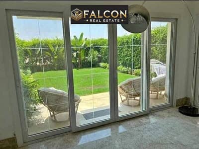 Last ready-to-move in a prime location + 3 facades Apartment with Garden near villas in Creek Town New Cairo opposite Rehab & close to Taj City.