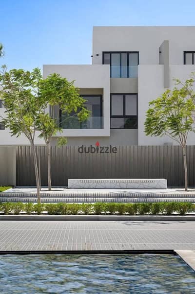 A villa with a landscaped view, finished with air conditioning, for sale in the best location in Future City next to Madinaty.