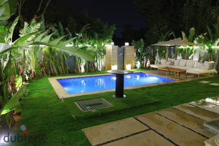 A premium villa for rent in Madinaty, first occupancy. Features a private swimming pool, fully air-conditioned, and modern furnished.