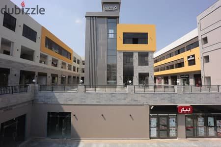 Commercial shop for sale in Mercado Mall – El Shorouk, currently leased to a brand.