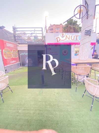لقطة محل 10 متر في حديقة تيفولي بجوار Burger Republic جاهز علي الفرش