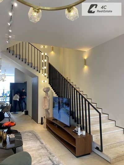 For quick sale: Townhouse resale, fully finished, designed by Hany Saad, in Mark Gardens Compound, Fifth Settlement, with remaining installments,