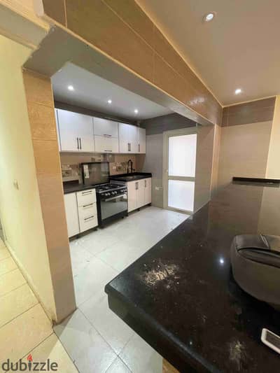 Office for rent, a full floor with two apartments on a street parallel to Al-Nasr Road, Nasr City, 600m, first use, licensed administrative