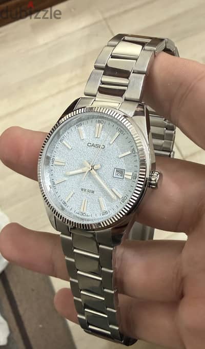 Casio MTP Silver Blue Dial