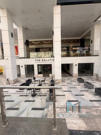 Shop for rent suitable for a café or restaurant in Maadi, located in Degla Square Mall, 66 sqm, ground floor.