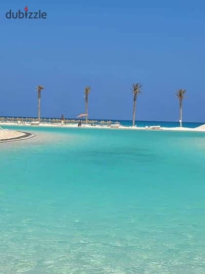 شاليه متشطب بفيو مميز علي البحر للبيع في هسيندا راس الحكمه الساحل الشمالي