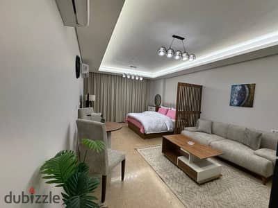 استوديو مفروش أول سكن  أبراج زد  دور عالي  لقطة  للايجار