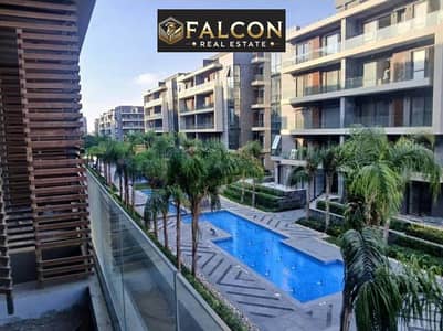 Two-bedroom apartment with a down payment of 450,000 in Al Patio Sola La Vista compound, next to Madinaty, minutes from Open Air Mall, "clear sea view