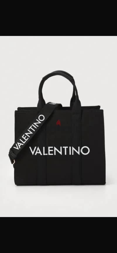 Black Valentino bag new with dust bag it can be shoulder or hand bag