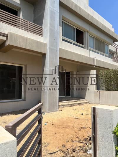 : town house for sale with open view on water features in granda life el sherouk ready to move core and shell   Bayut arabic title