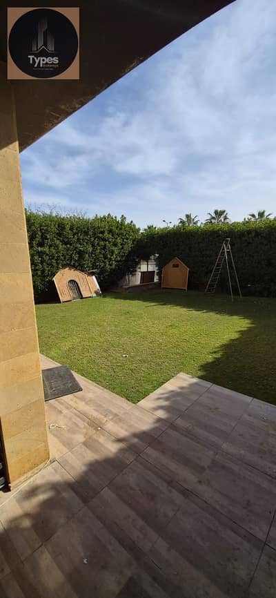 Ground floor apartment for rent, 125 sq m with a 100 sq m garden, fully equipped with air conditioning and a kitchen, in Westown Compound, next to alg
