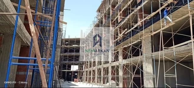 32m² clinic in Sheikh Zayed, ready for occupancy in 6 months, down payment 421,000, installments over 3 years, on a main street