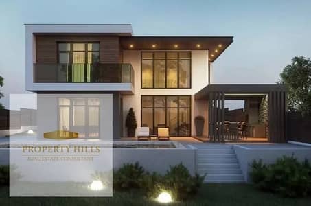 Last villa for sale at a bargain price next to the American University in New Cairo's Fifth Settlement with a large garden area.