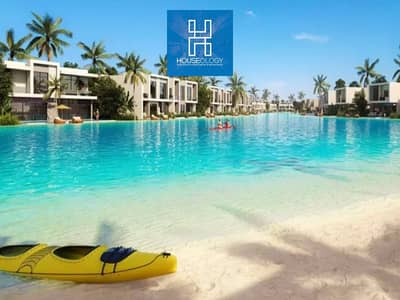 تاون هاوس ريسيل للبيع بأقل من سعر الشركه في ازها الساحل الشمالي بفيو مميز علي اللاجون Azha North Coast