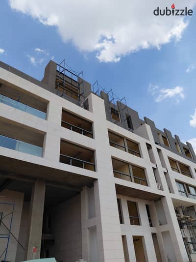 apartment one bedroom in Karma Kay with a 400,000 EGP down payment fully finished with Acs and payment plans available over 8 years in Sheikh Zayed