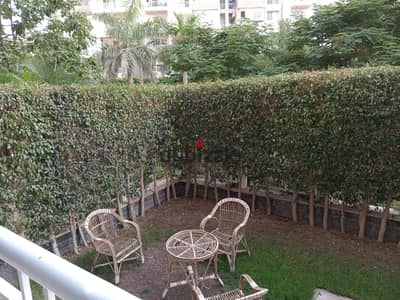 Ground floor apartment with a private garden for sale in Madinaty, Phase B10, in front of the mosque and services.
