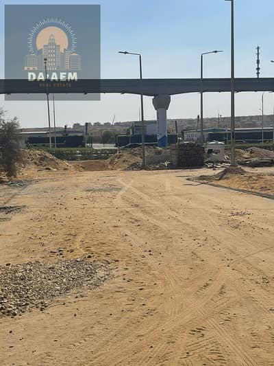 Land for sale with a frontage on a garden in the 8th District of Beit El Watan, Fifth Settlement, New Cairo.