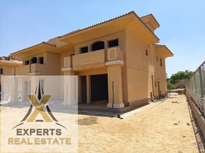 Large standalone villa 615m without finishing for sale in Madinaty with an open view