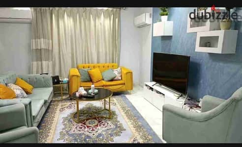 Furnished apartment for rent in the Ashgar Darna compound, consisting of two bedrooms, a reception, a bathroom, and a kitchen.