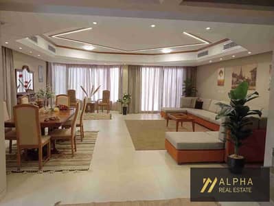 Fully Furnished Twin Villa for Rent in Top View Compound featuring a luxury design with pool and landscape view equipped with smart home systems in a prime location near AUC and main roads