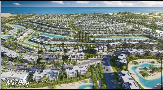 شاليه أرضي للبيع مارباي المراسم Mar Bay AL Marassem فيو لاجون مباشر تشطيب مميز أقساط ومقدم موقع مميز جدًا بالساحل الشمالى