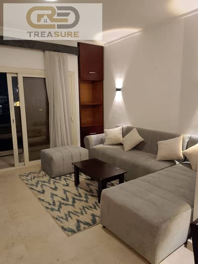 furnished Studio with Garden for rent in The Village - new cairo