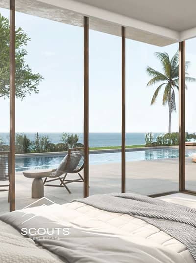 5 steps from the lagoon with an open sea view, chalet for sale in The Med Ras El Hekma, North Coast, next to Ras El Hekma Airport, El Alamein Airport,