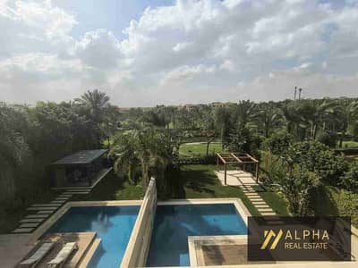Triplex for Rent in Katameya Dunes featuring a luxurious multi level layout with a private pool and garden along with full air conditioning and kitchen in a prime location within a prestigious community