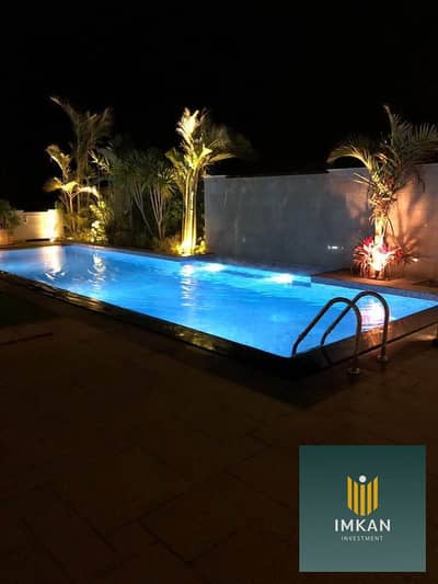 Chalet with a 140m terrace, a great deal for sale, fully finished with air conditioning, in Sodic View overlooking a sea lagoon in the village of Ogam