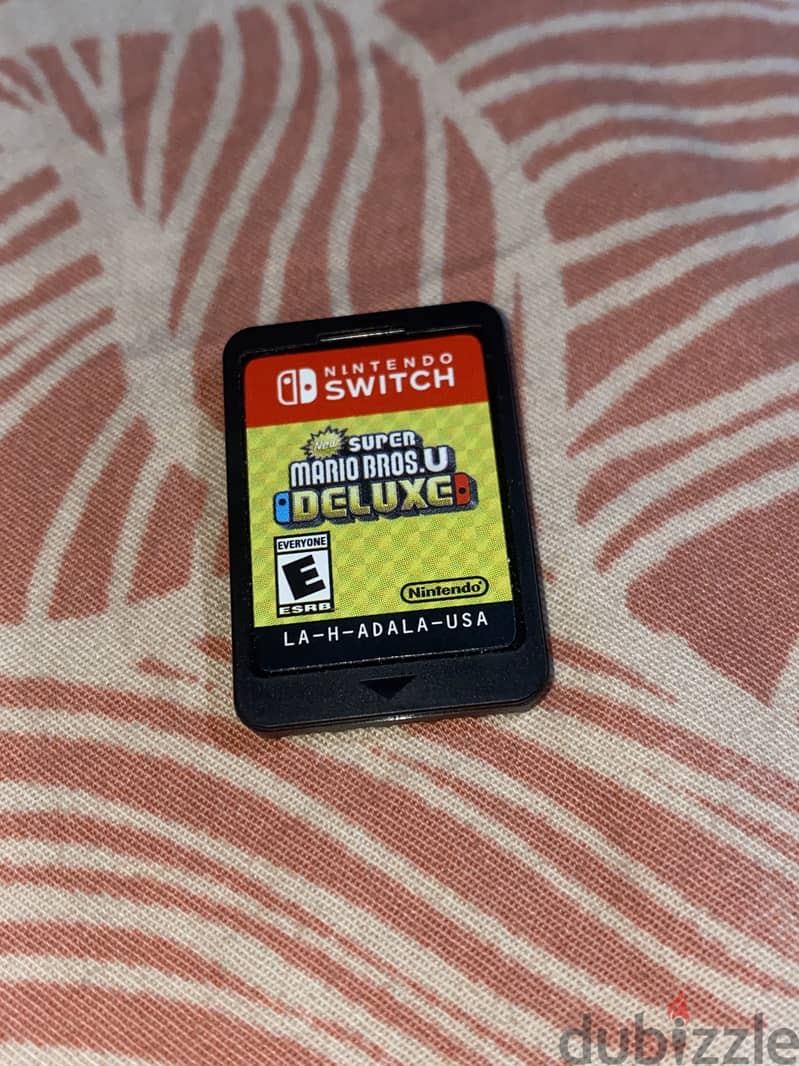 Nintendo switch v2  mario bros deluxe 1